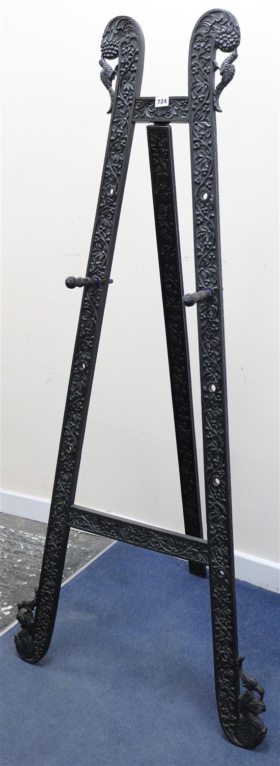 An Anglo-Indian ebonised carved wood easel, H.161cm